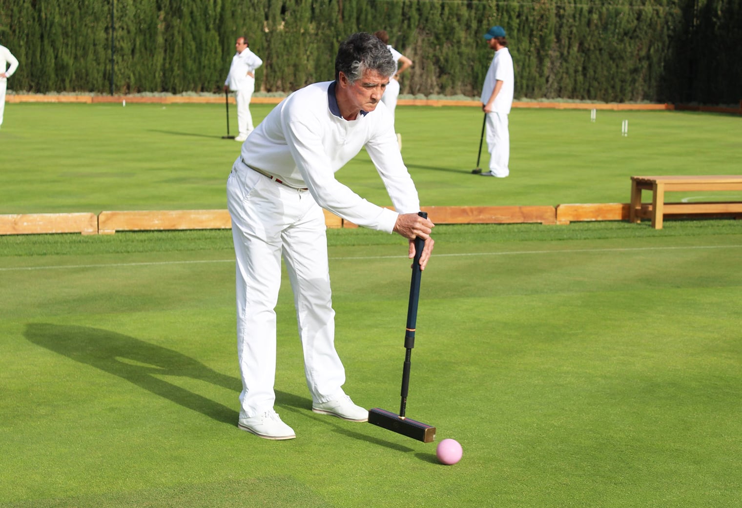 Juan Carlos, croquet mallet maker on the playing field